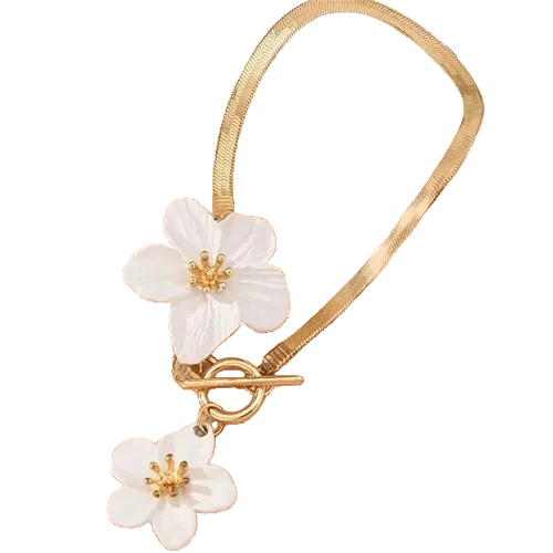 Chaîne de cheville dorée raffinée ornée de fleurs sculptées • Collection Édition Île • Atelier Zolya